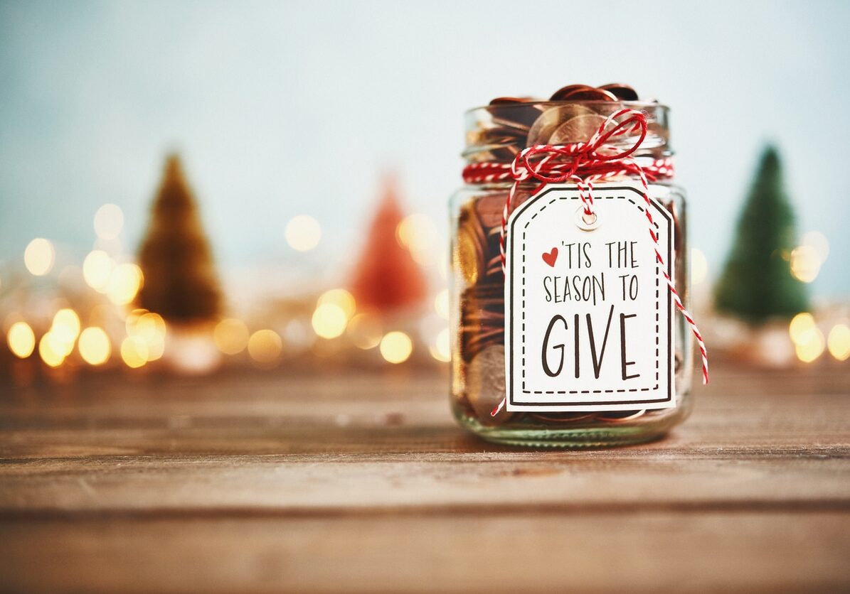 It's the season to give. Donation jar with money